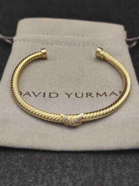 David Yurman's bracelet with a cross motif